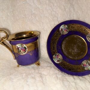 Elegant Purple and Gold Coffee Cup and Saucer Set